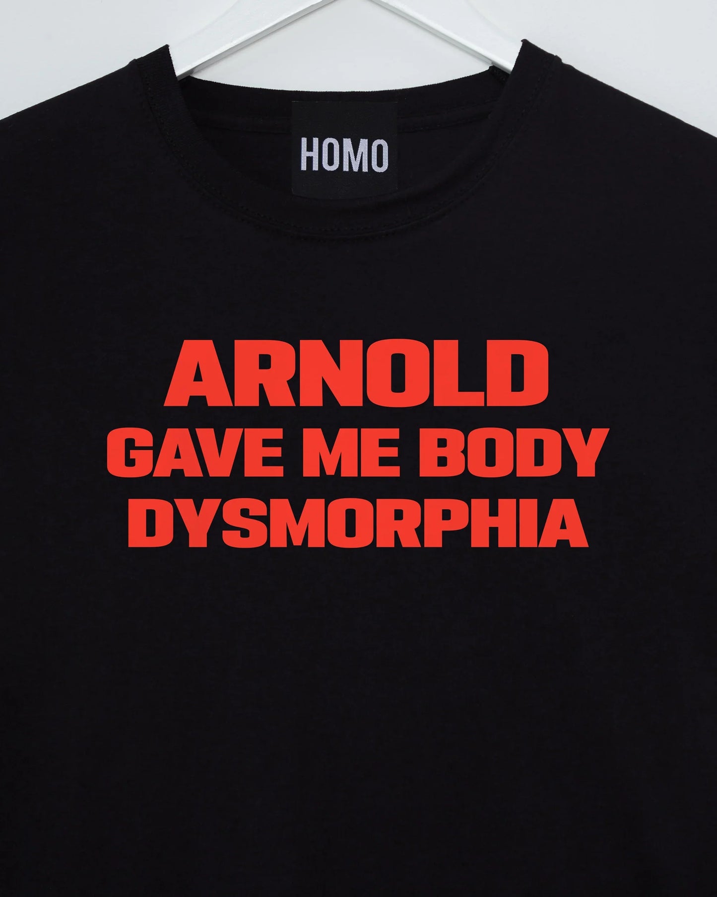 Arnold gave me body dysmorphia, red print on black - tshirt