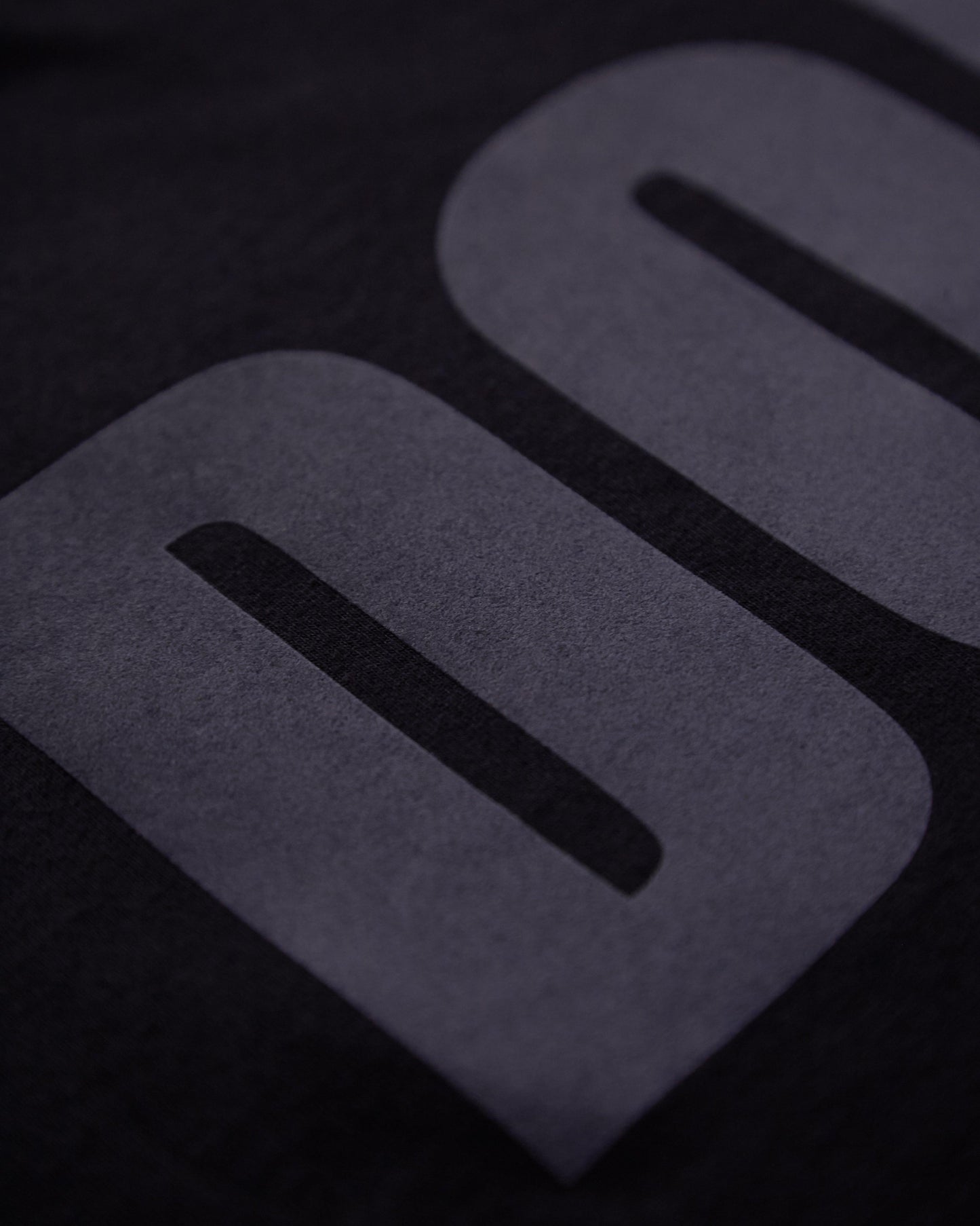Explore Your Dominant Side with DOM: Grey Flock Print on Black Men's Tshirt - HOMOLONDON