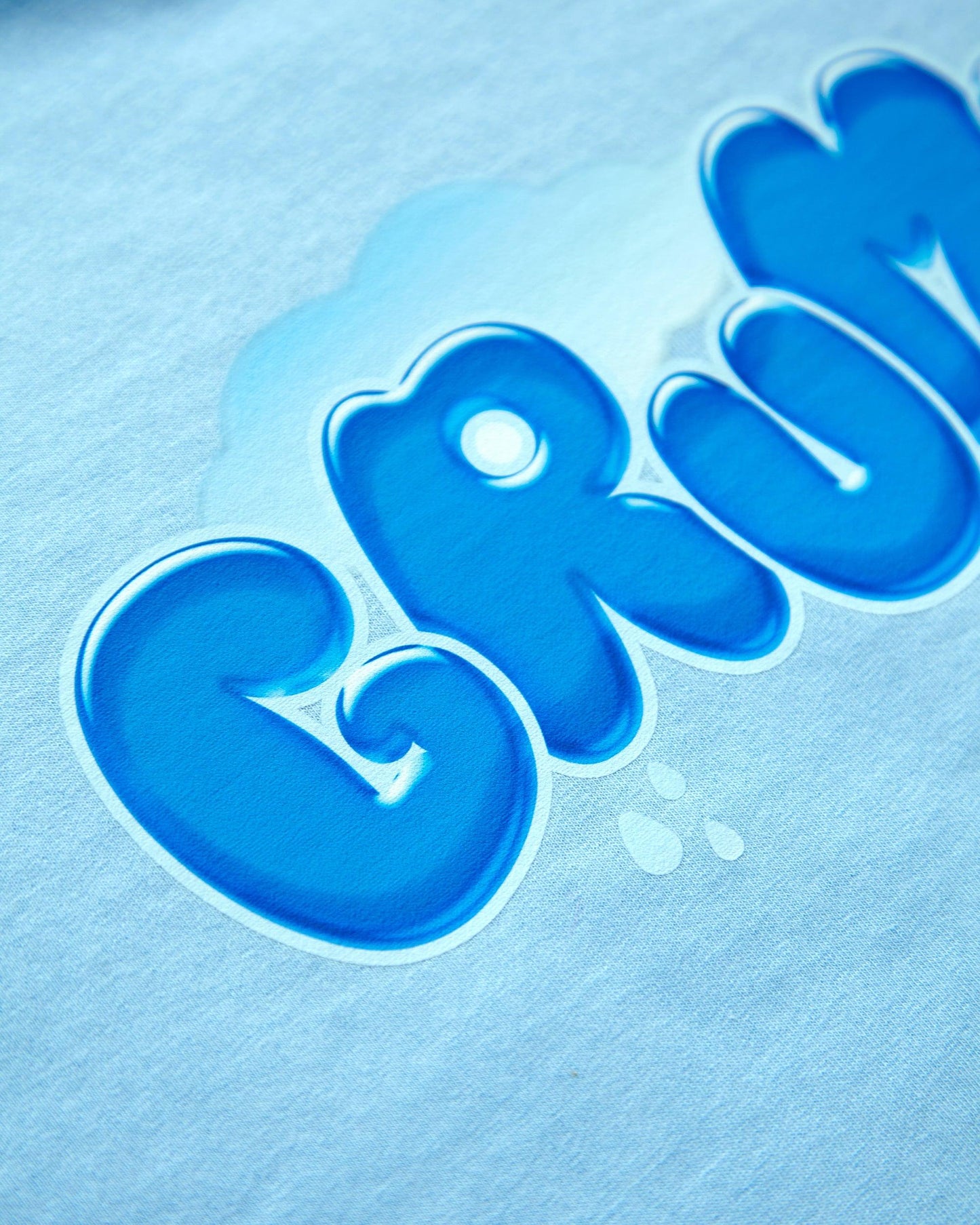 Grumpy on blue - cropped tee.