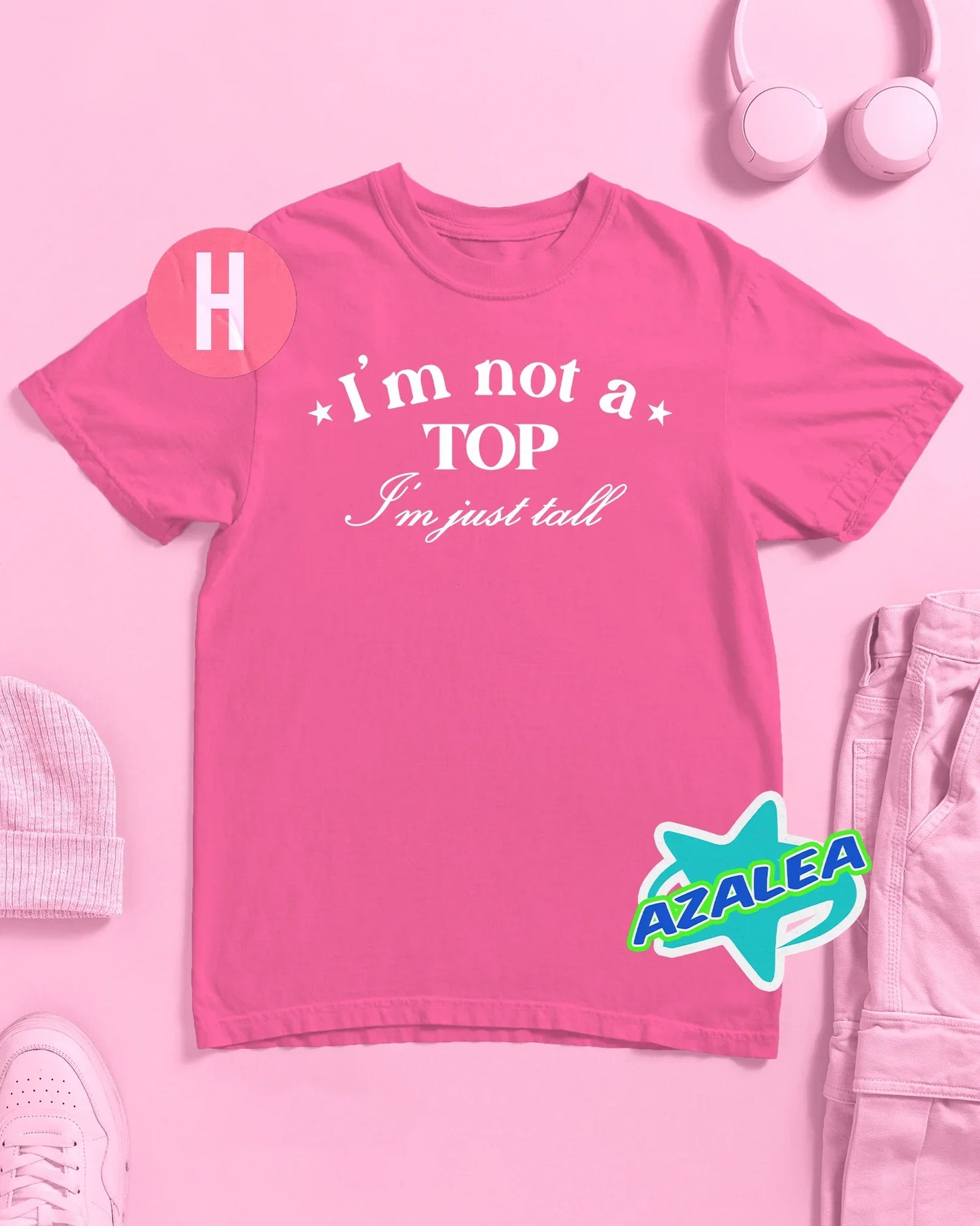 I'M NOT A TOP, I'M JUST TALL slogan on pink - tee
