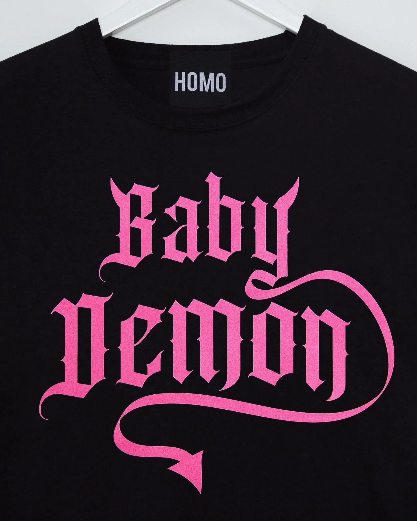 Baby Demon, pink flock on on black tshirt