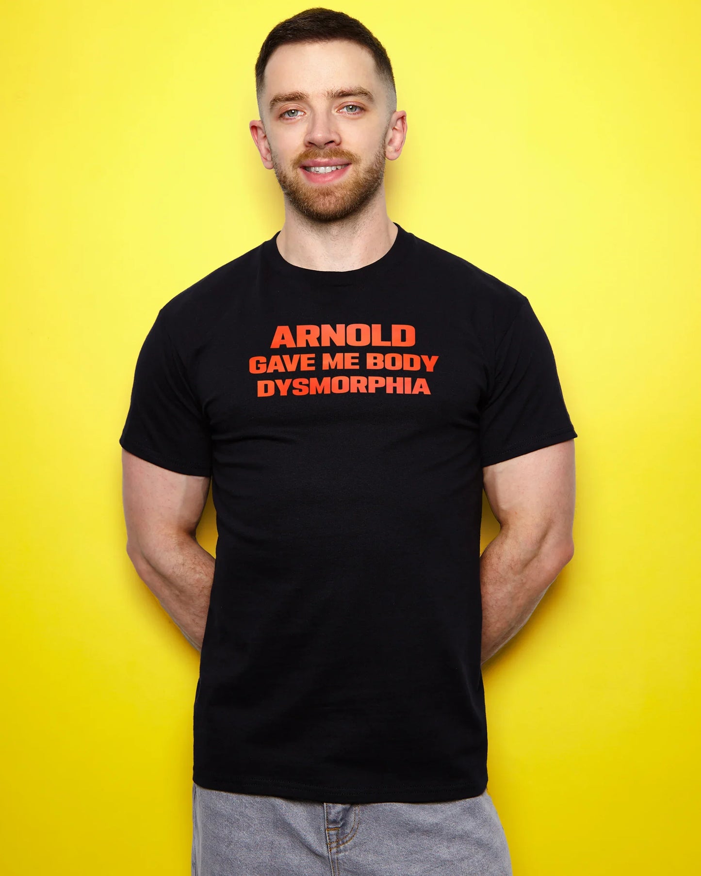 Arnold gave me body dysmorphia, red print on black - tshirt