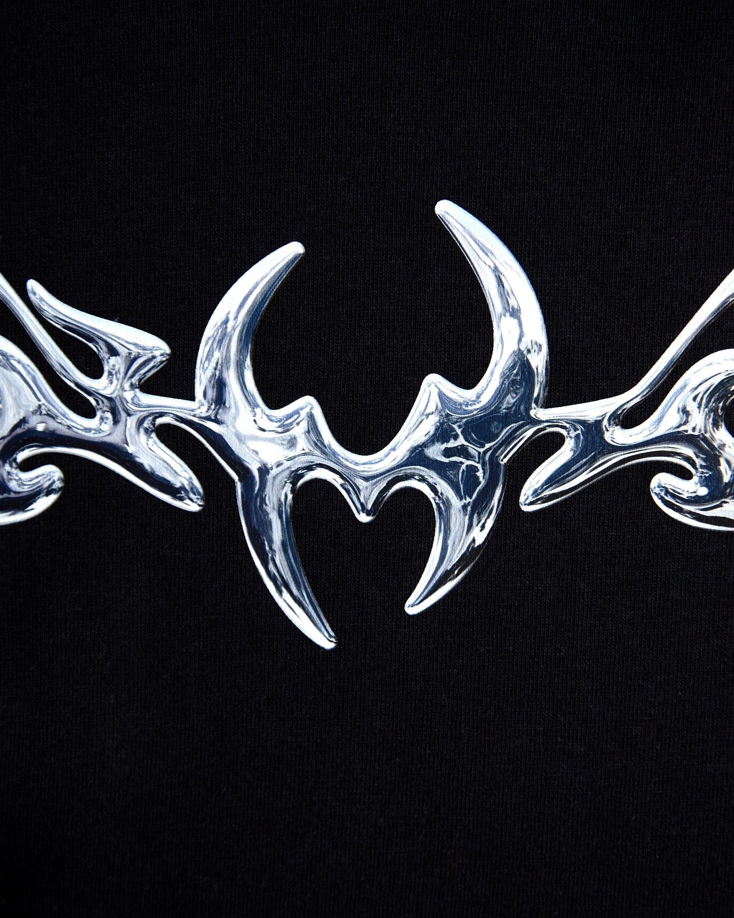 NXS005: Silver style print on black tshirt