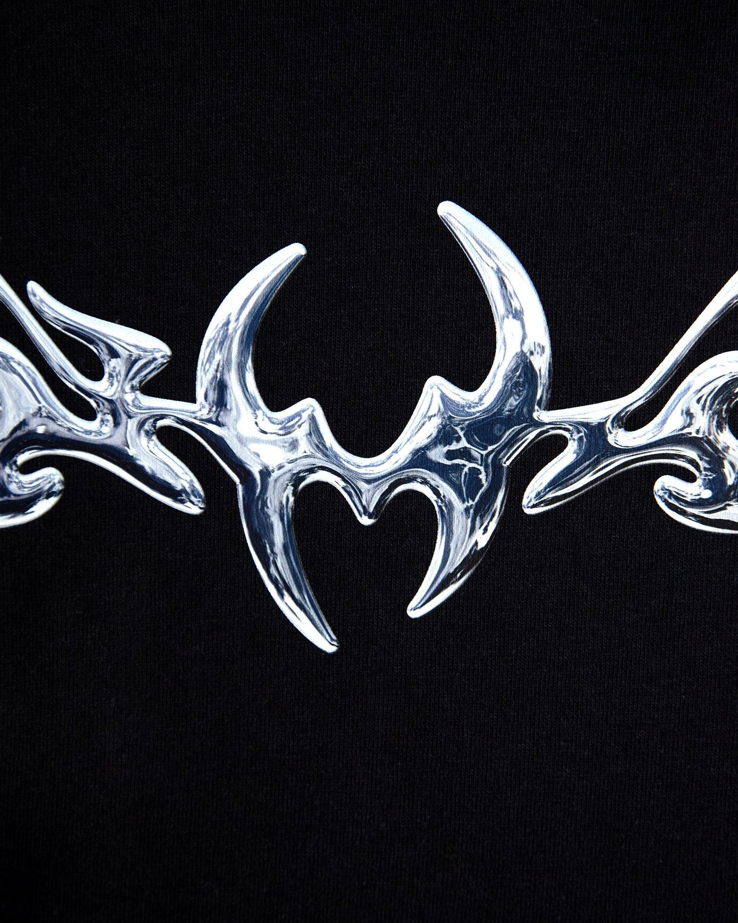 NXS005: Silver style print on black tshirt