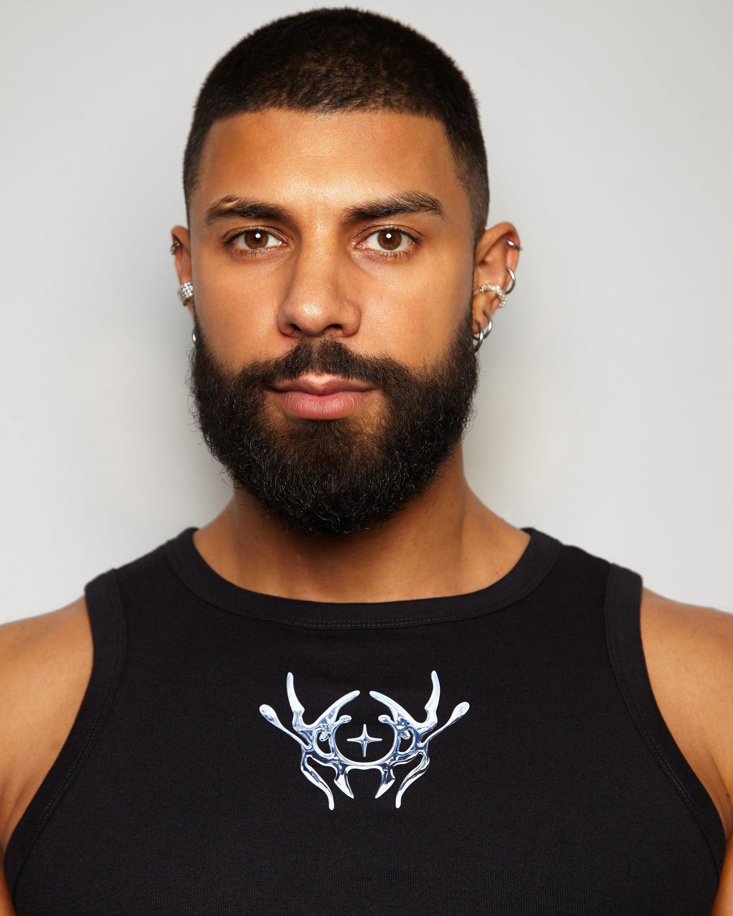 NXS015: Silver style print on black micro rib muscle crop tank