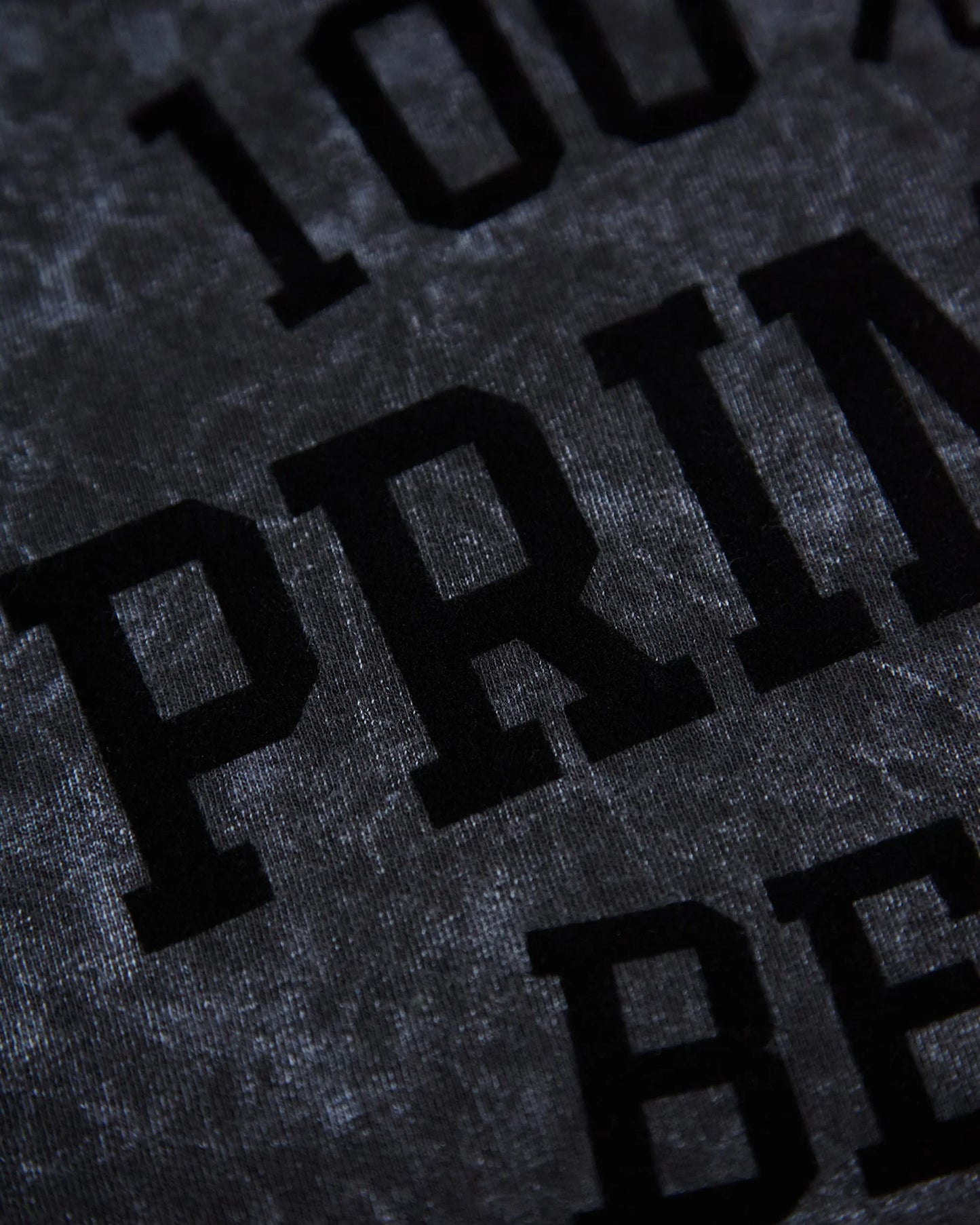 100% Prime Beef - black flock on stone washed black tshirt