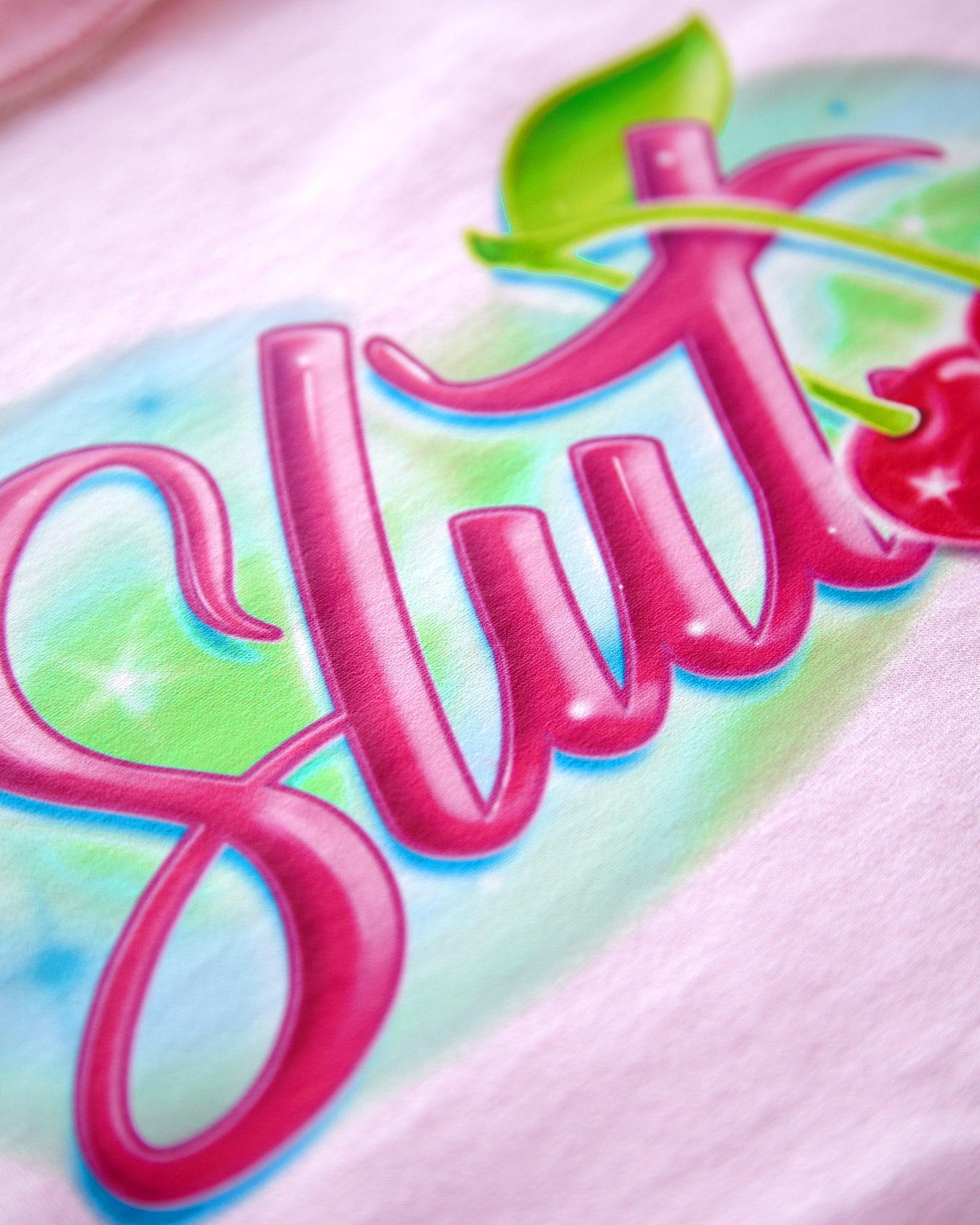 Spray paint slut on pink - sleeveless crop top.