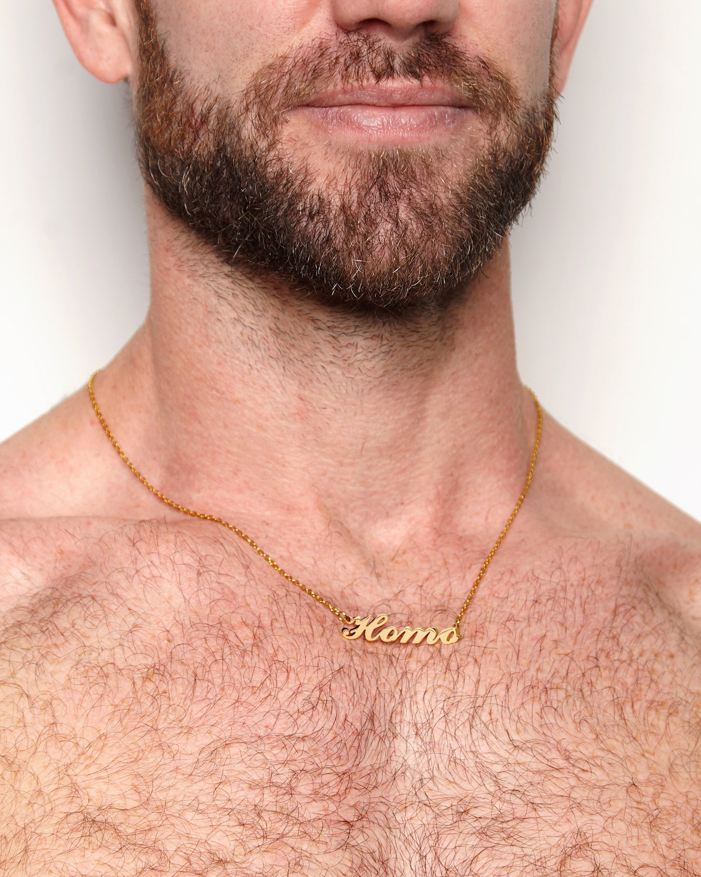 HOMO calligraphy gold plated, stainless steel necklace