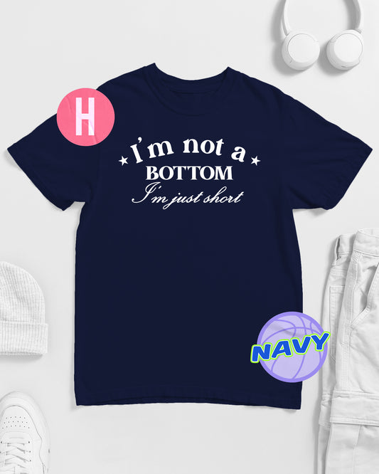 I'M NOT A BOTTOM, I'M JUST SHORT slogan on navy - tee