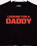 Black t-shirt with red text 'LOOKING FOR A DADDY' on a white background