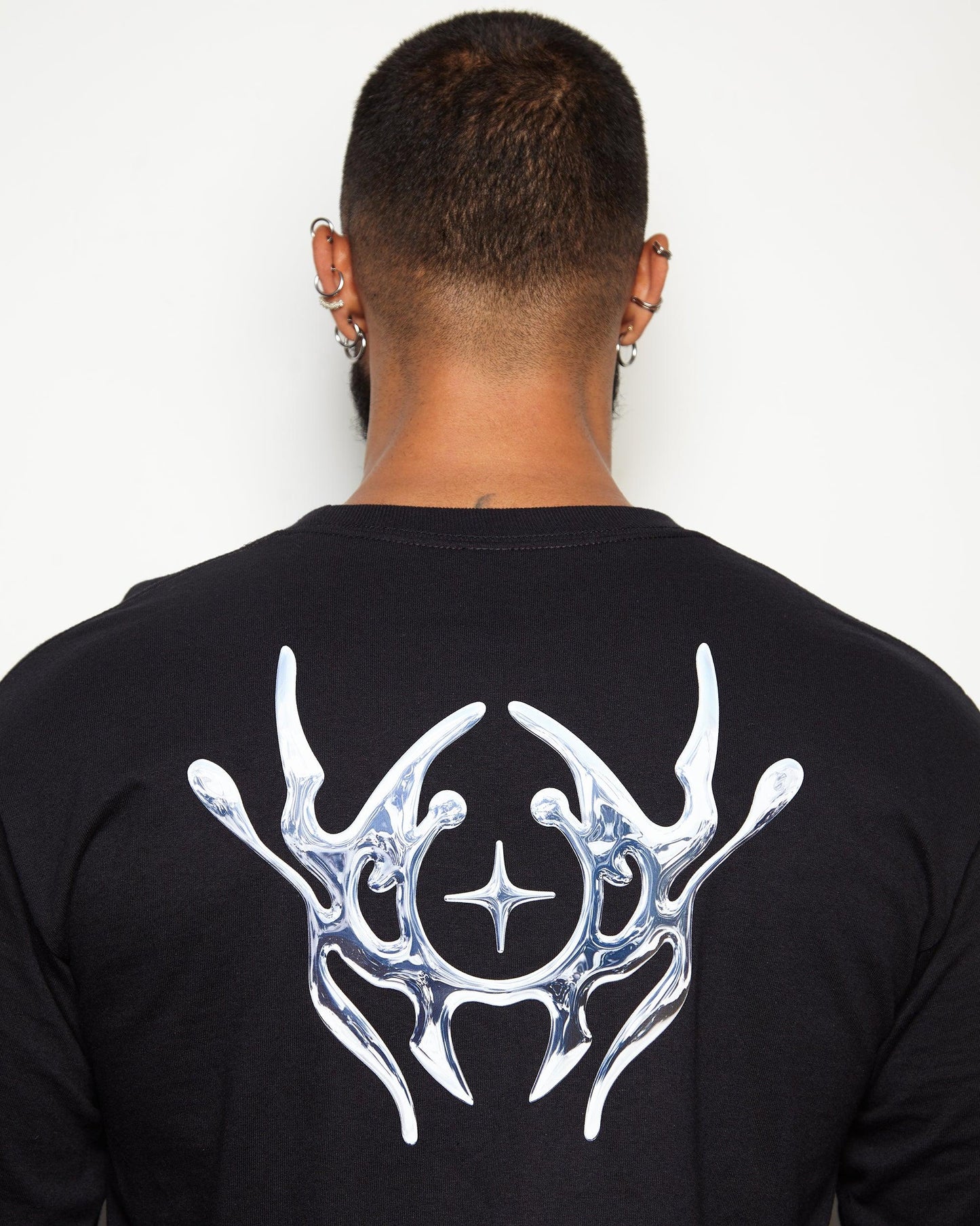 NXS004: Silver style print on black long sleeve tee