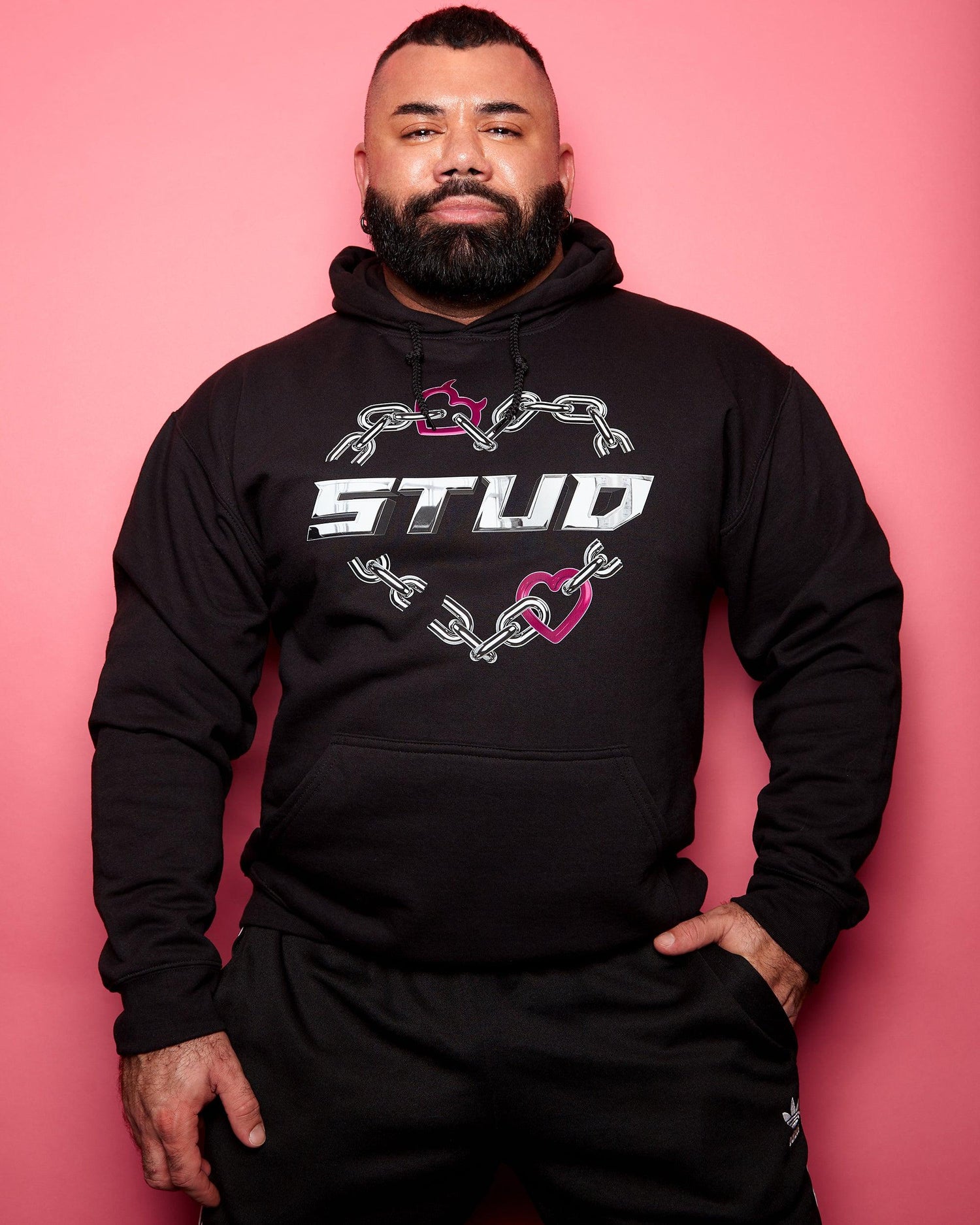 Broken chain heart stud on black pullover hoodie. HOMOLONDON