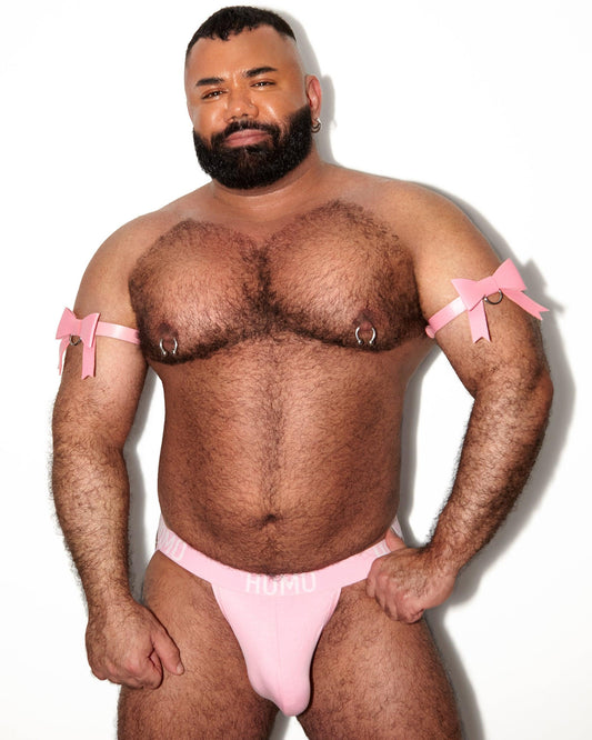Get the look! Pink bow outfit. Includes bicep bands and classic jock
