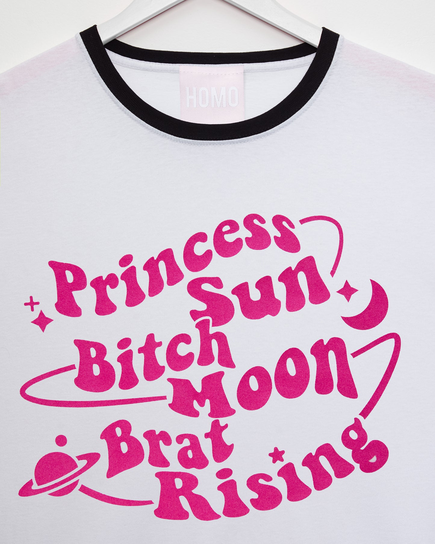 princess sun, bitch moon, brat rising. Pink flock on black trim -  slim fit tee.