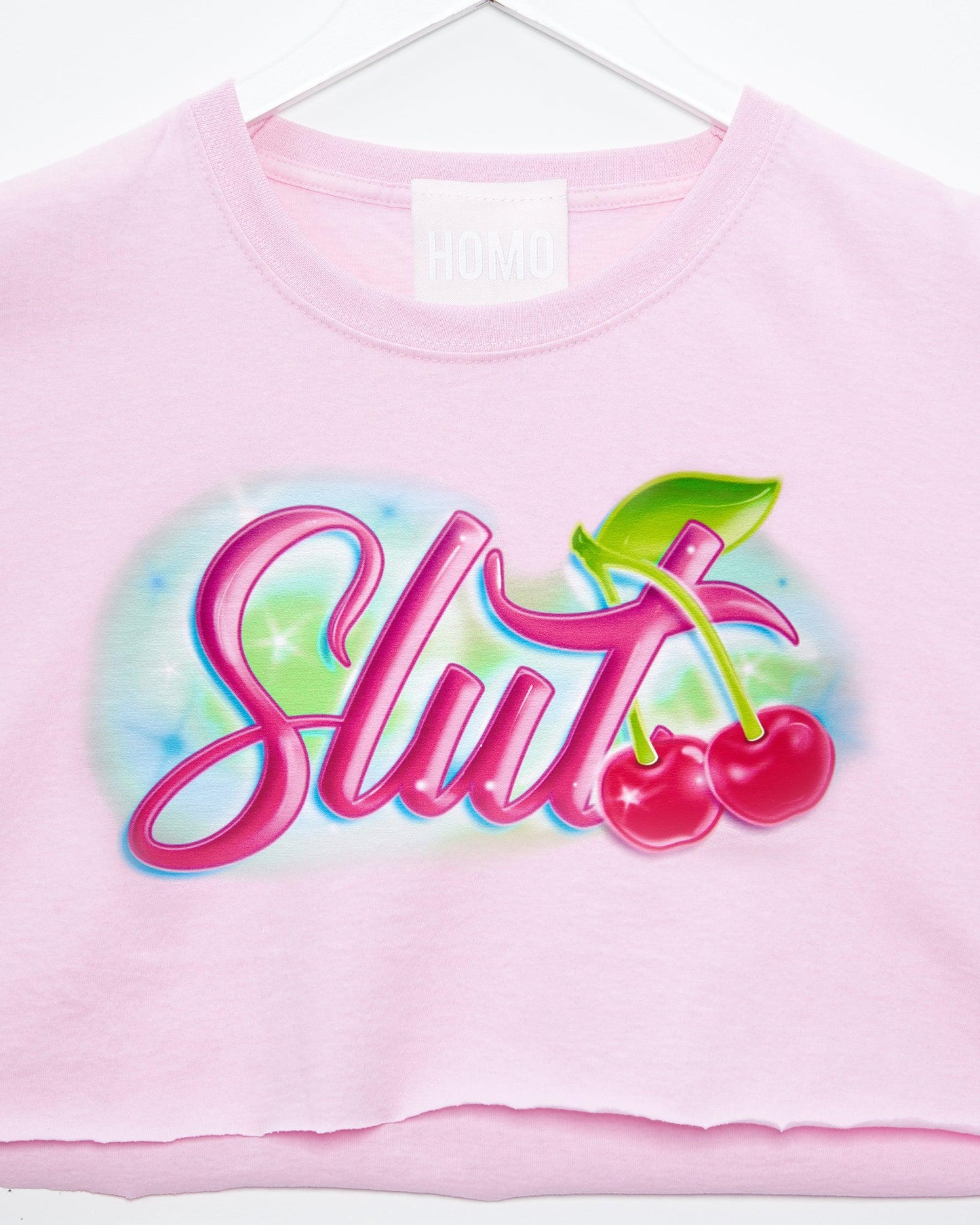 Spray paint slut on pink - sleeveless crop top.