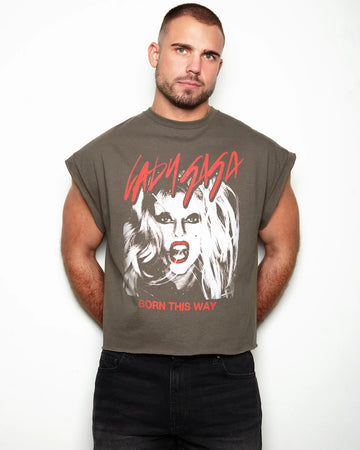 Man wearing a sleeveless shirt with a  Lady Gaga "Born This Way" graphic and text.