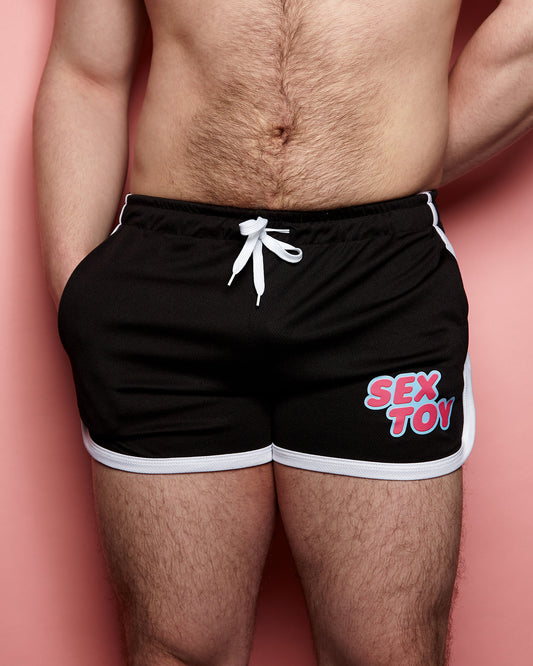 Sex toy on black - short shorts