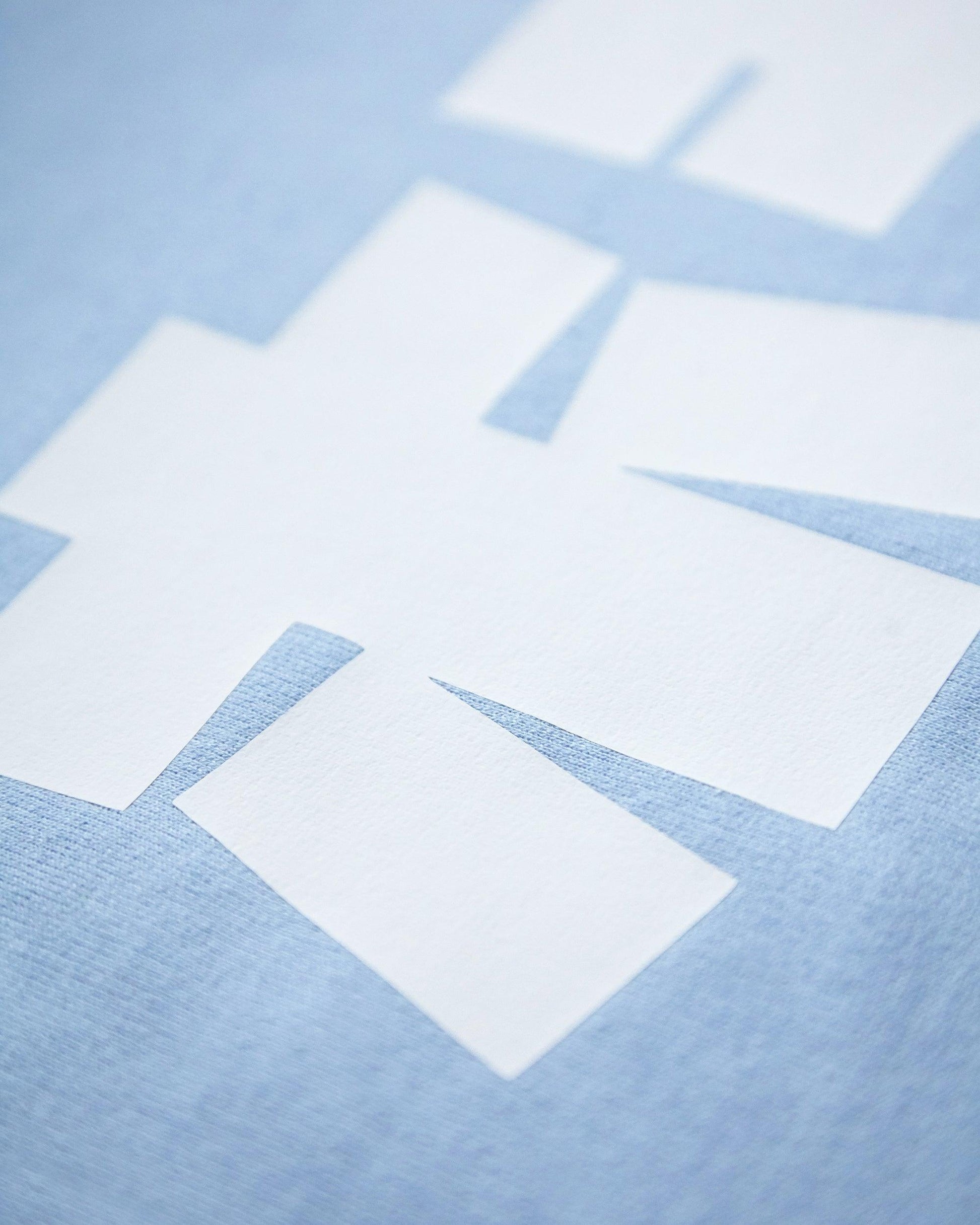 HOMO In Japanese, white on light blue - pullover hoodie. - HOMOLONDON