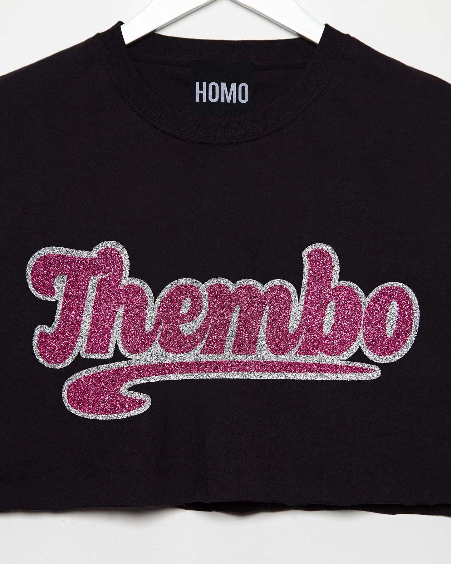 Thembo, pink/silver glitter on black - Sleeveless crop-top.