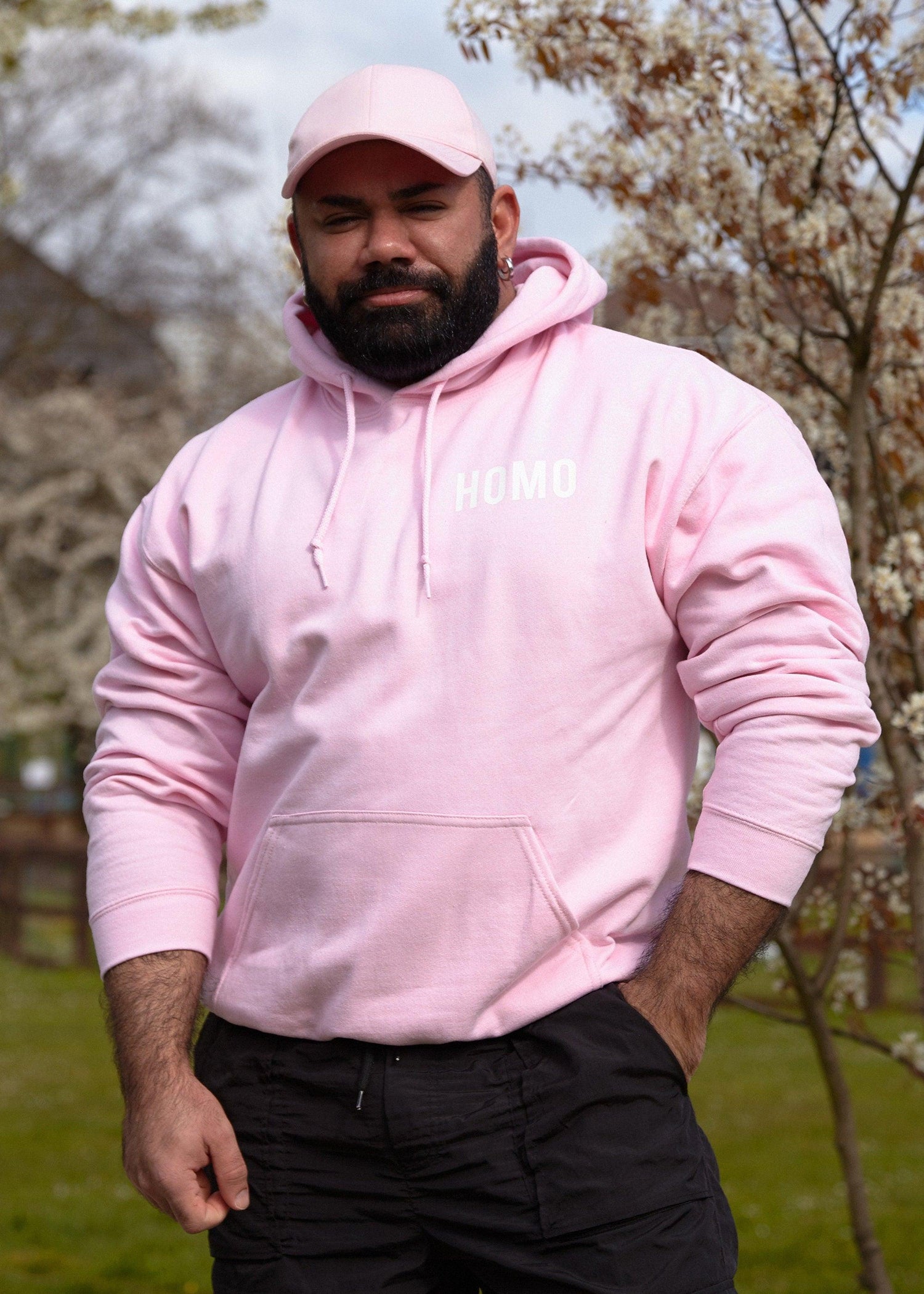 HOMO logo, white on pink - pullover hoodie - HOMOLONDON