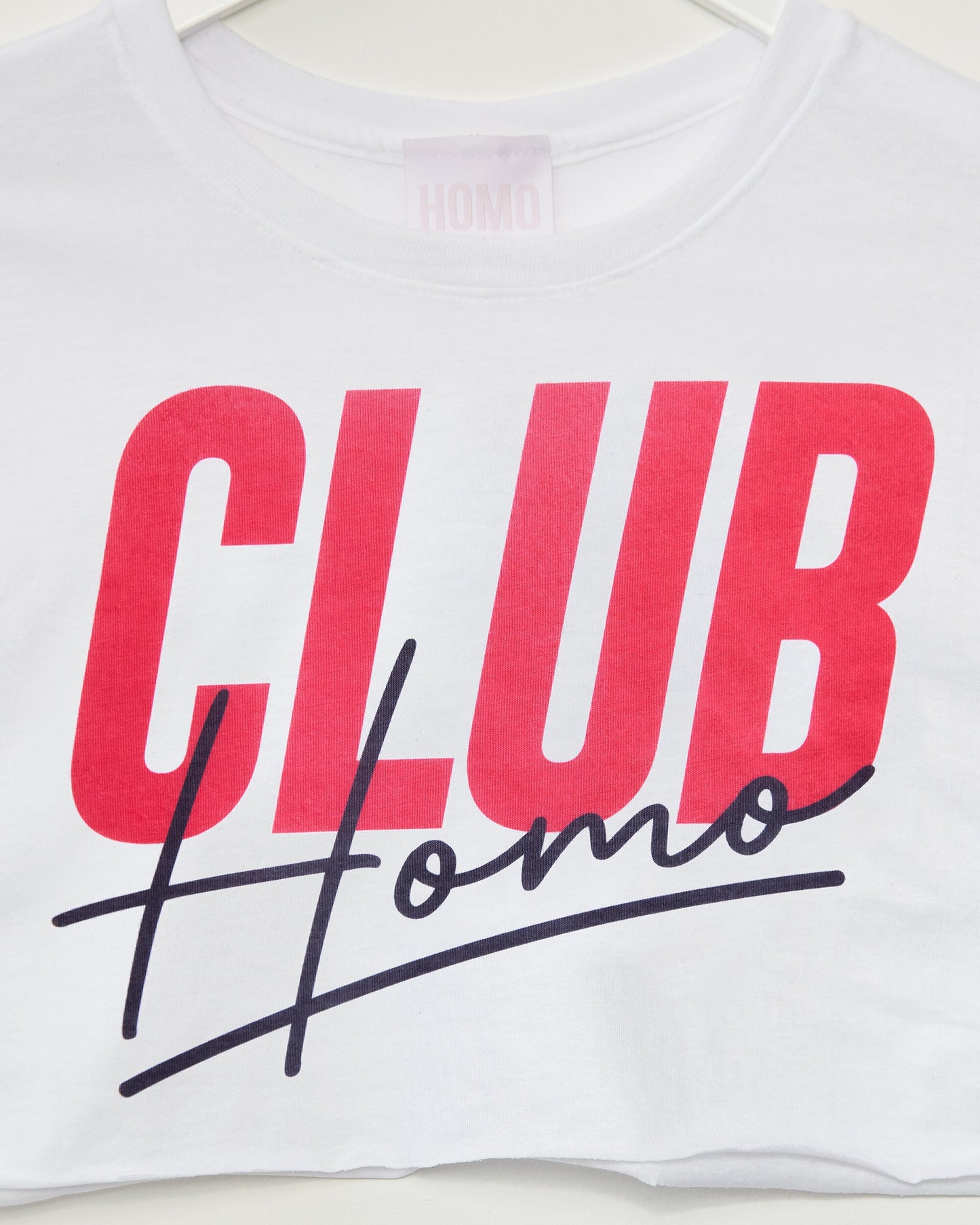 Club HOMO - Sleeveless crop-top.
