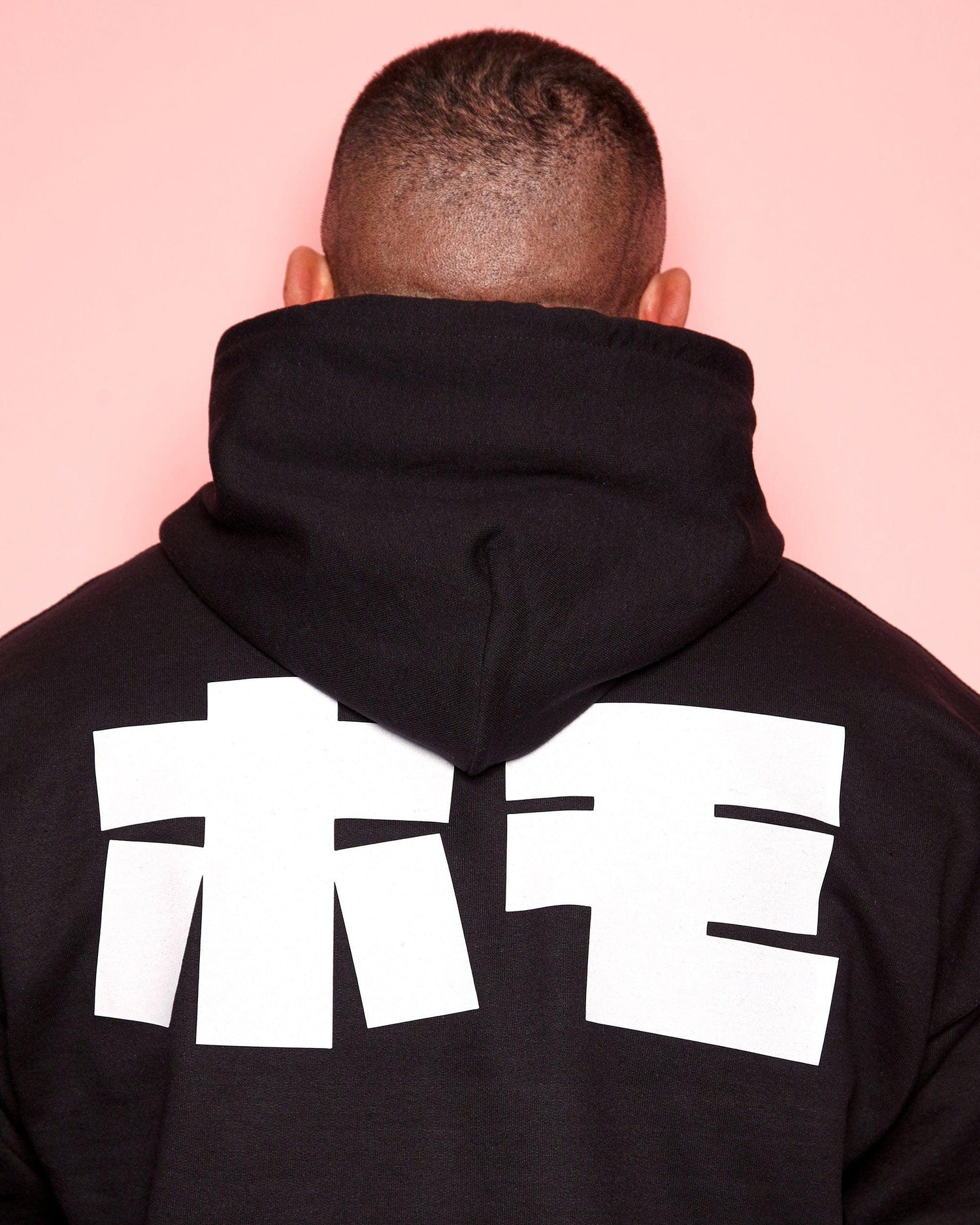 Embrace Minimalistic Sophistication: HOMO In Japanese, White on Black Pullover Hoodie - HOMOLONDON